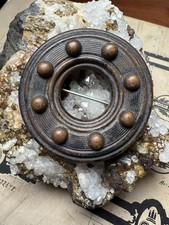 Antike Brosche aus Vulkanit